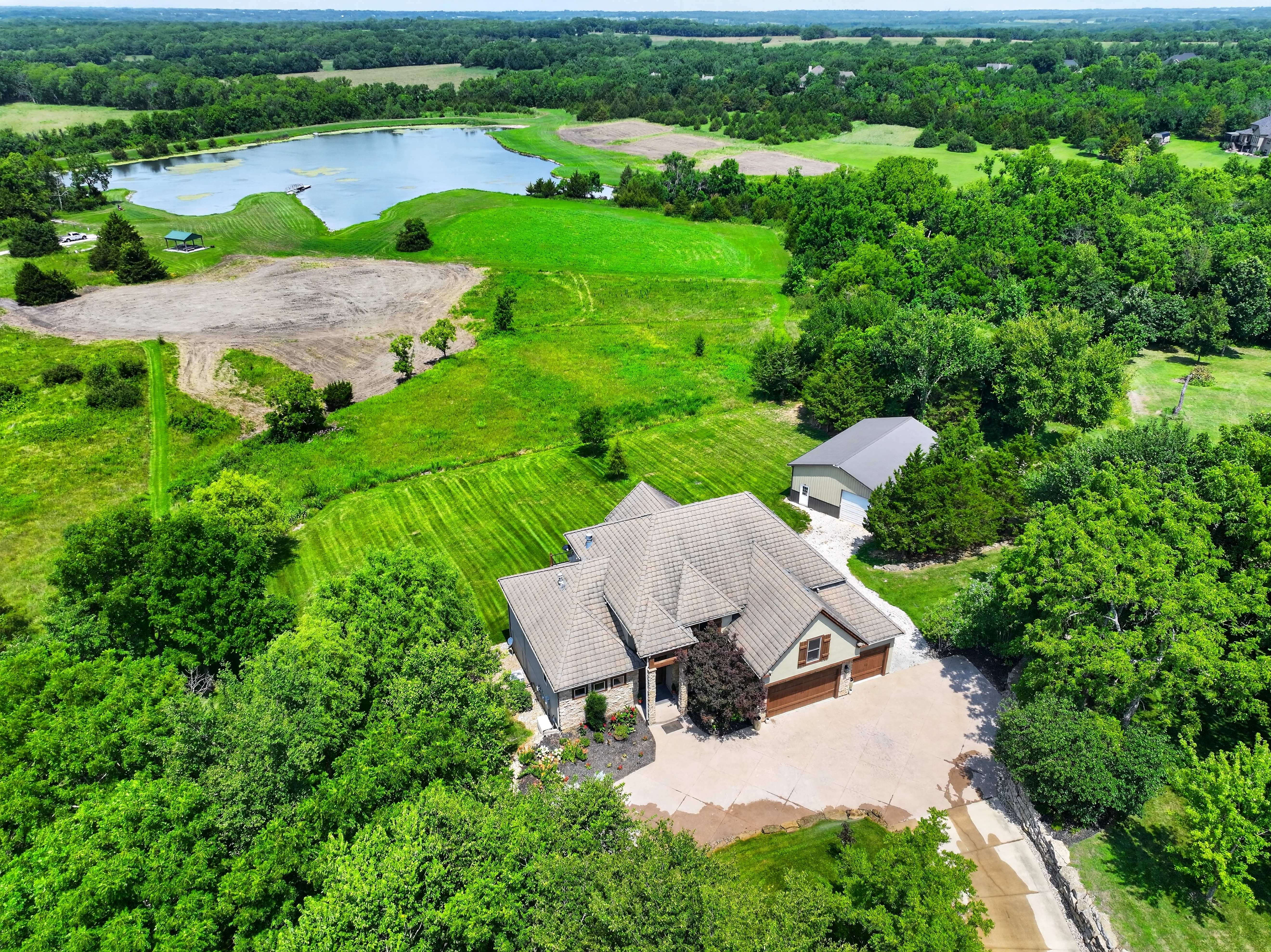 Aerial photography of a new construction home by Parker I. Johnson